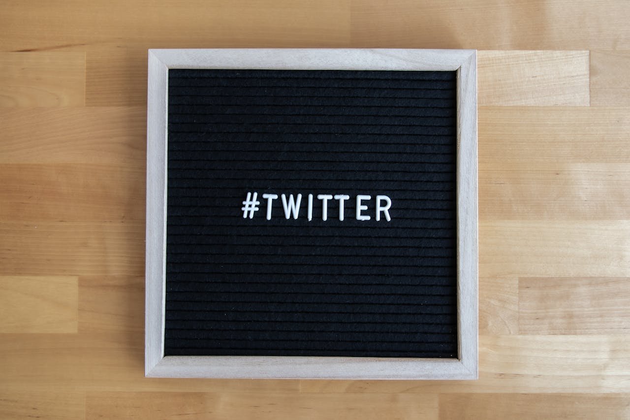 Home A letter board with the hashtag Twitter displayed, ideal for social media marketing concepts.